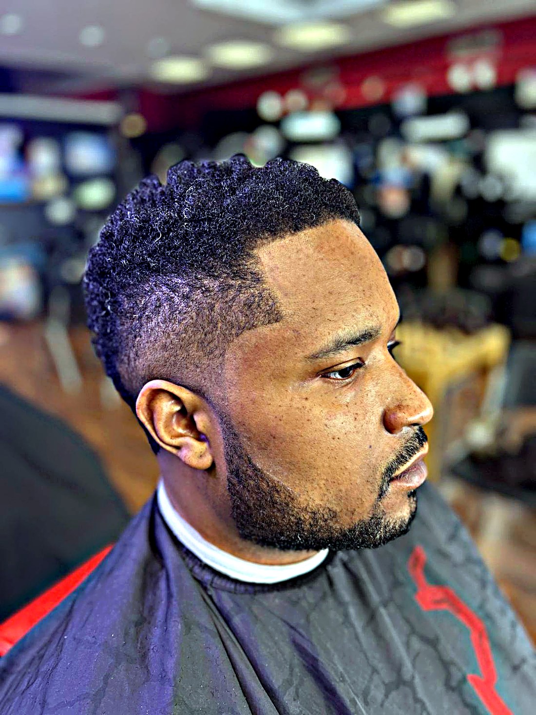 High top fade with full beard