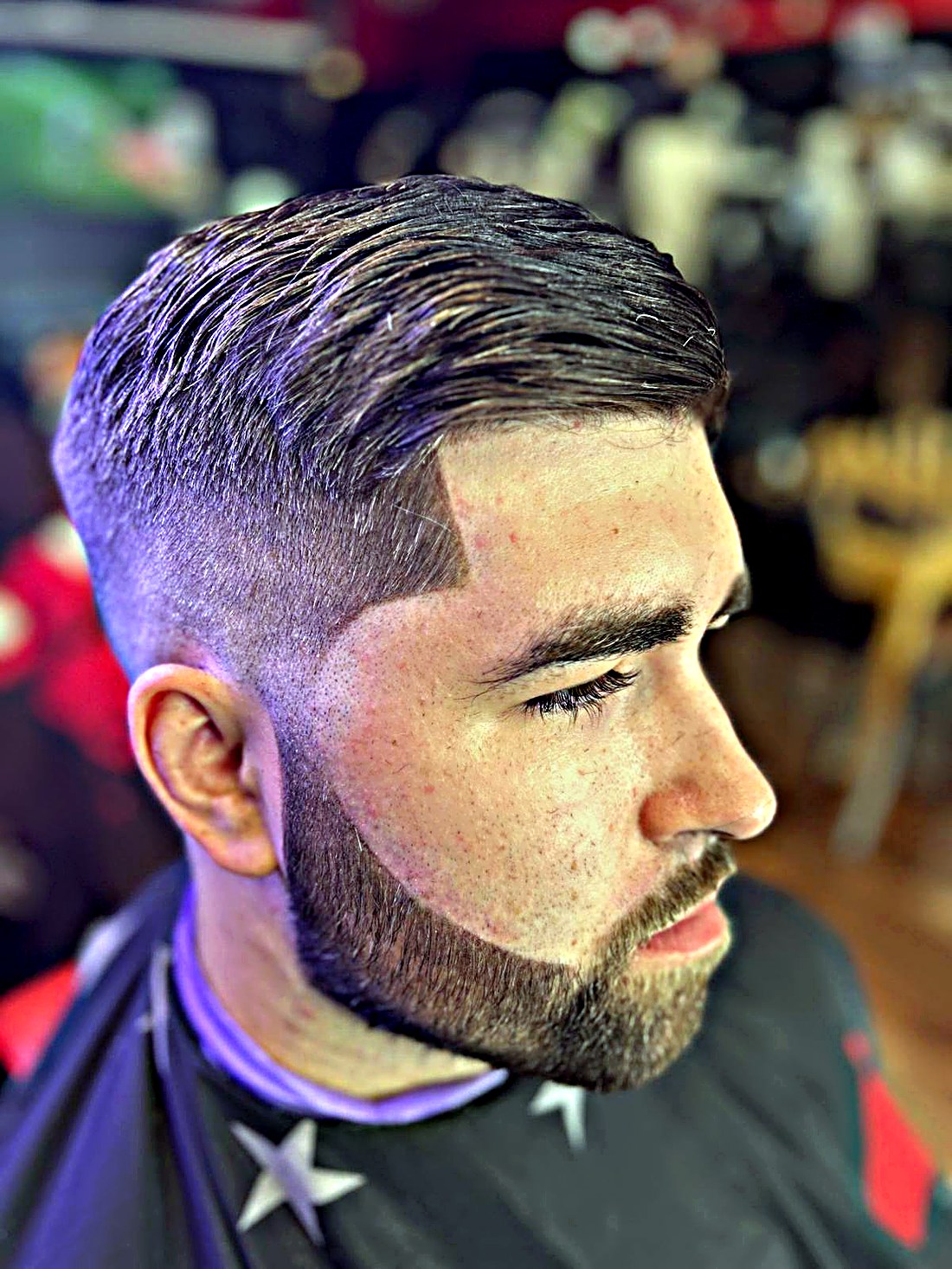 Slick back skin fade with beard sculpt