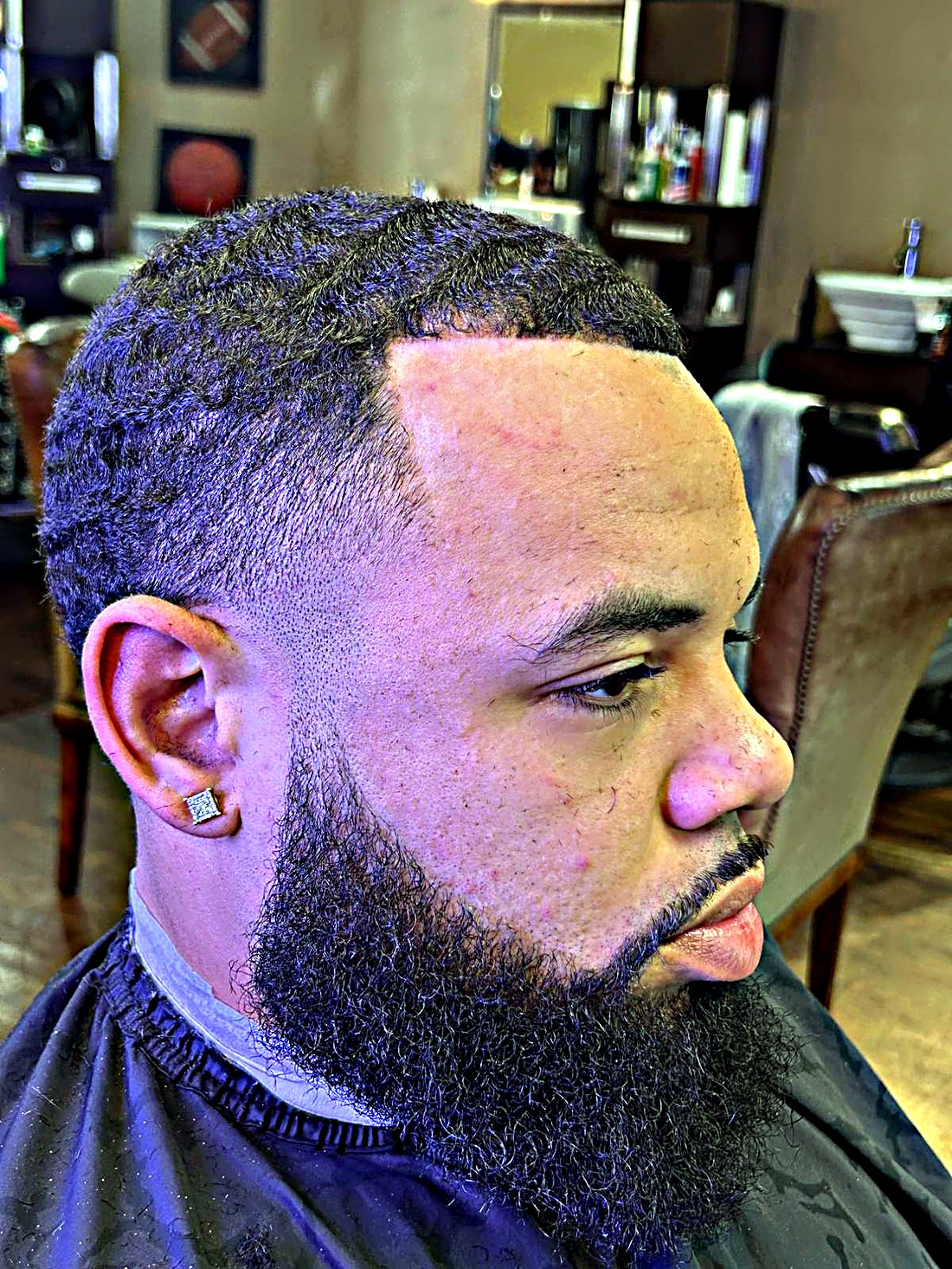 Skin fade with full beard