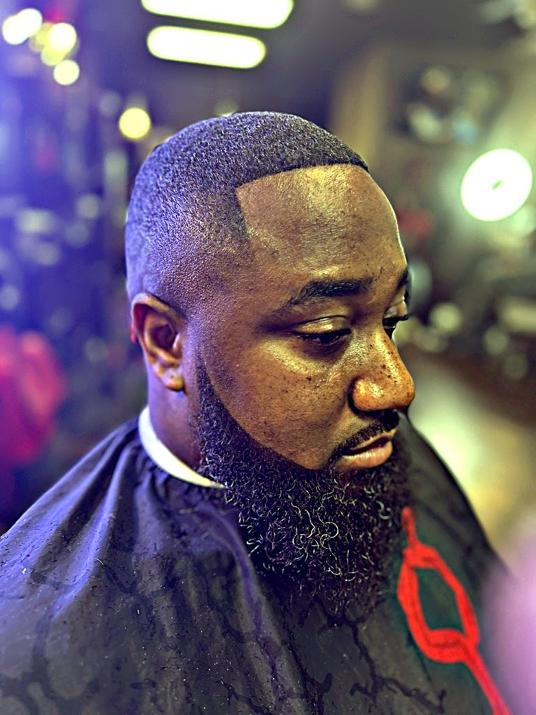 Bald skin fade with full beard