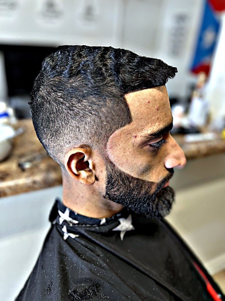 Skin fade with sculpted beard